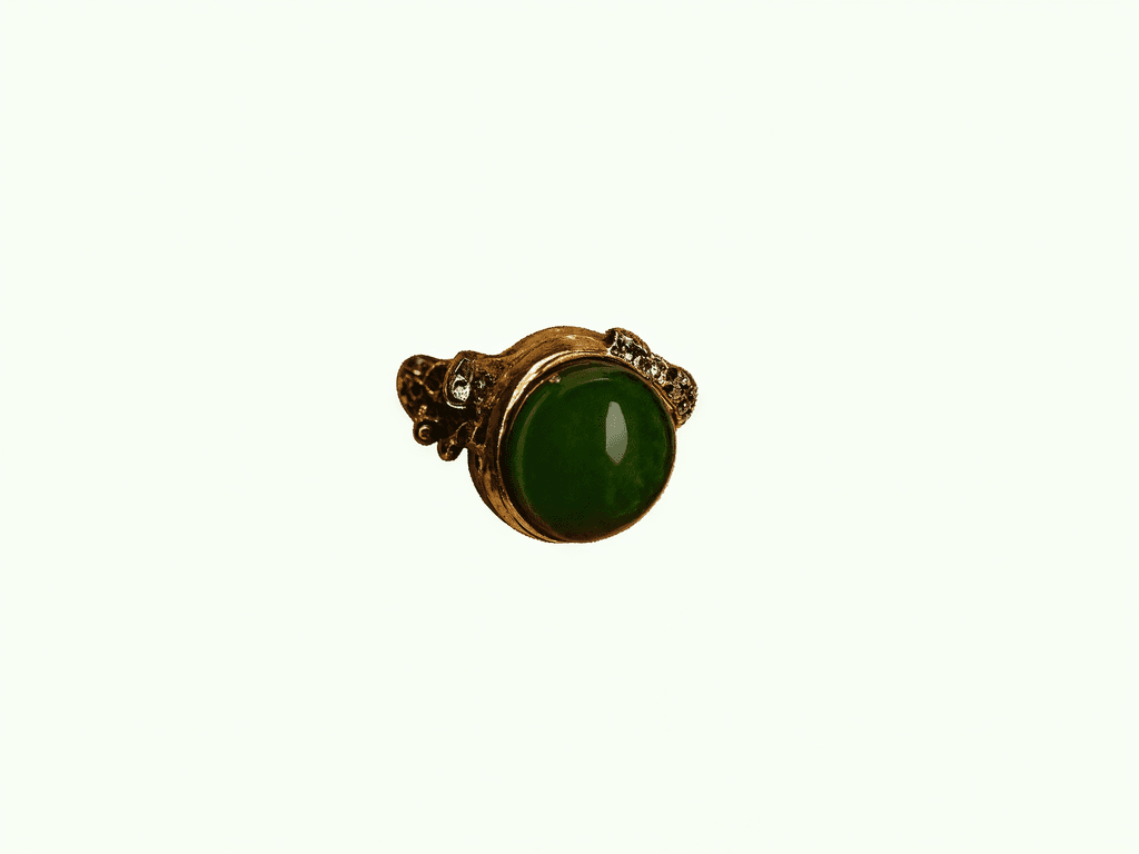 Verdant Solis Ring — deep green cabochon in antique gold
